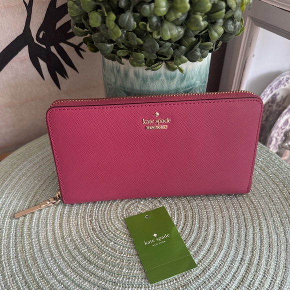 kate spade Handbags - Kate Spade ♠️ Dark Pink Saffiano Leather Wallet (has pen marks on outside back)